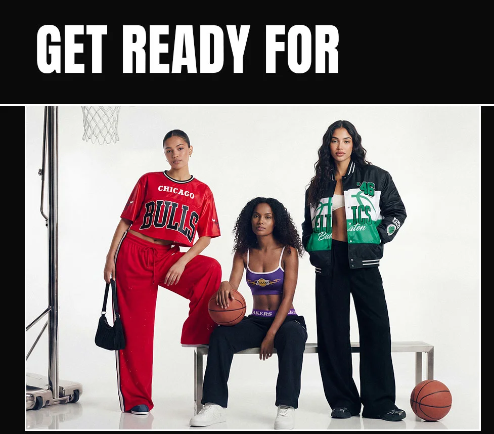 Three women pose in a minimal basketball court setting, showcasing new NBA fashion: red Bulls, purple Lakers, green Celtics. Get ready for the latest collection.