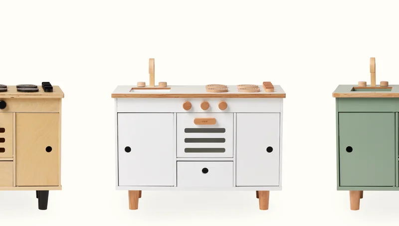 The Play Kitchen is back (and better than ever), in stock, and ready to ship! Treat your tiny chef to a kitchen that mirrors real-life cooking functions with interactive knobs, doors, and add-on accessories.