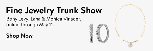 Fine jewelry trunk show. Diamond earrings and a gold necklace.