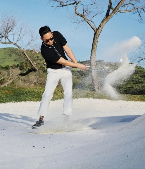 Man swinging golf club