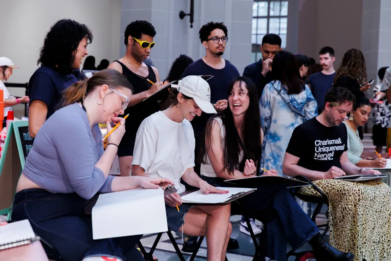 A group of people sketching