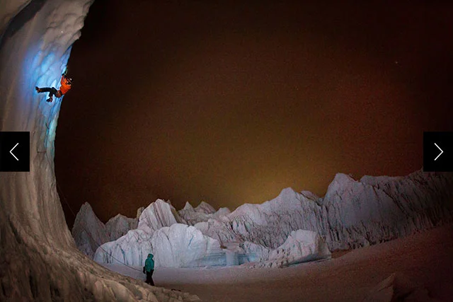 A mountaineer practices climbing techniques on ice during an evening training session near Everest's Base Camp in 2012.