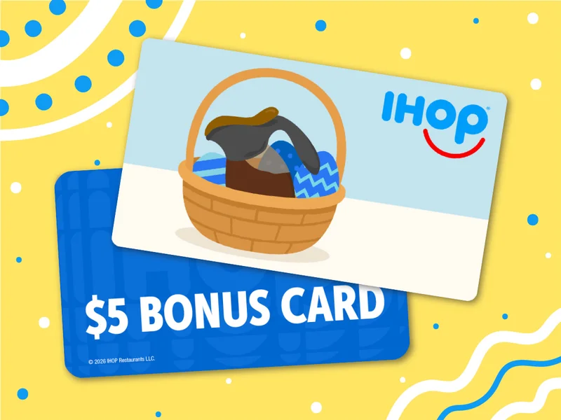 An illustrated gift card with a syrup caddy atop a blue blanket in a basket with a $5 bonus card behind it.