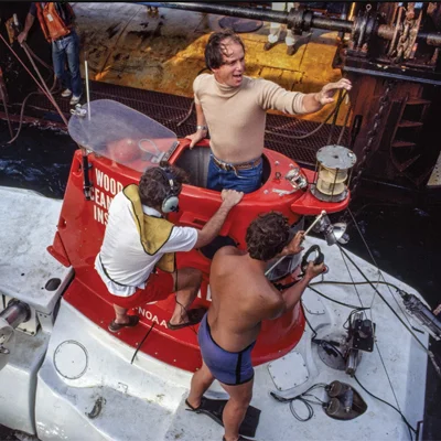 Robert Ballard emerges from the submersible Alvin after a 1979 dive to the Galápagos Rift. Ballard’s push for direct visual observation of the deepest reaches of the ocean has led to momentous scientific and historic discoveries.