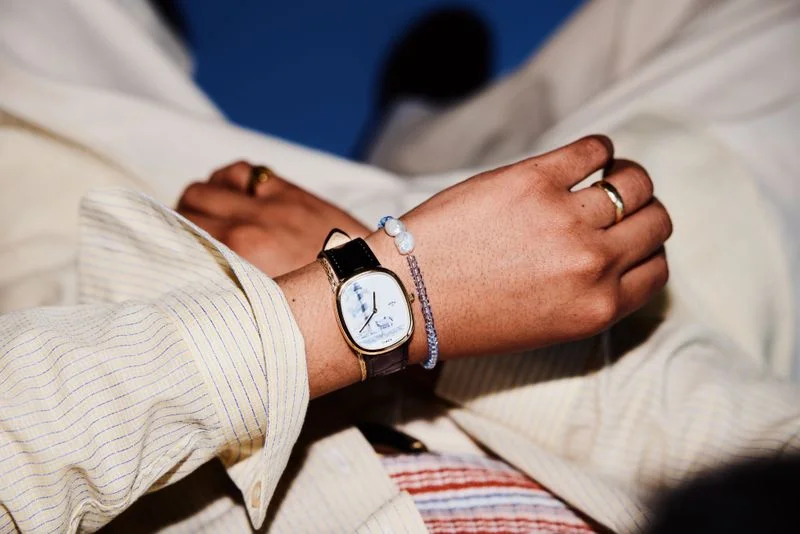 GQ staffer Michael Nolledo wearing the Noah x Timex Lighthouse watch.