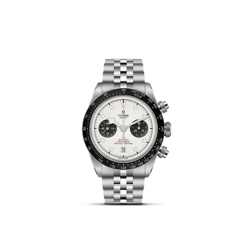 A sleek silver, black and white watch. A sleek silver, black and white watch.
