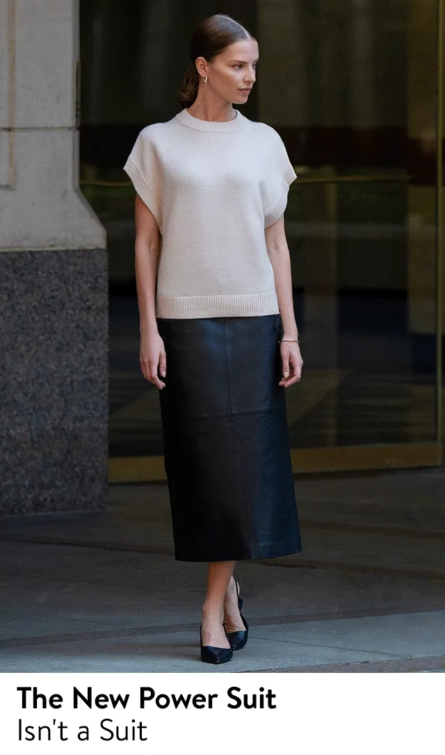 A woman wearing a white short-sleeve knit top and a black skirt; a woman wearing a black maxi dress with a black jacket.