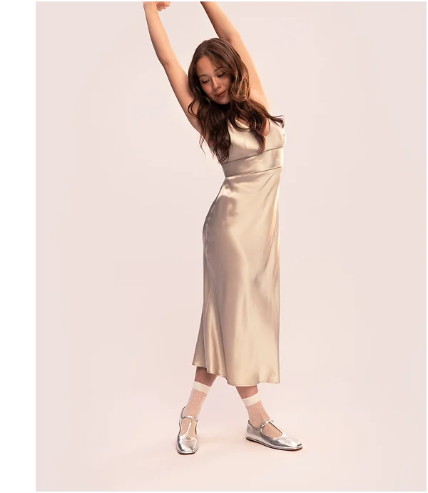 Image | Laufey in the Bias Cut Slip Dress in Silk Charmeuse | Peyote