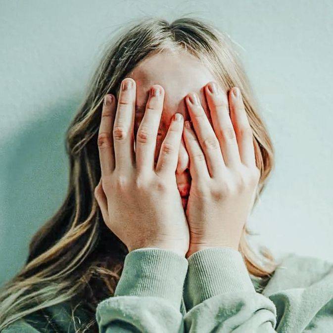 Why Are Gen Z Kids Covering Their Noses in Family Photos?