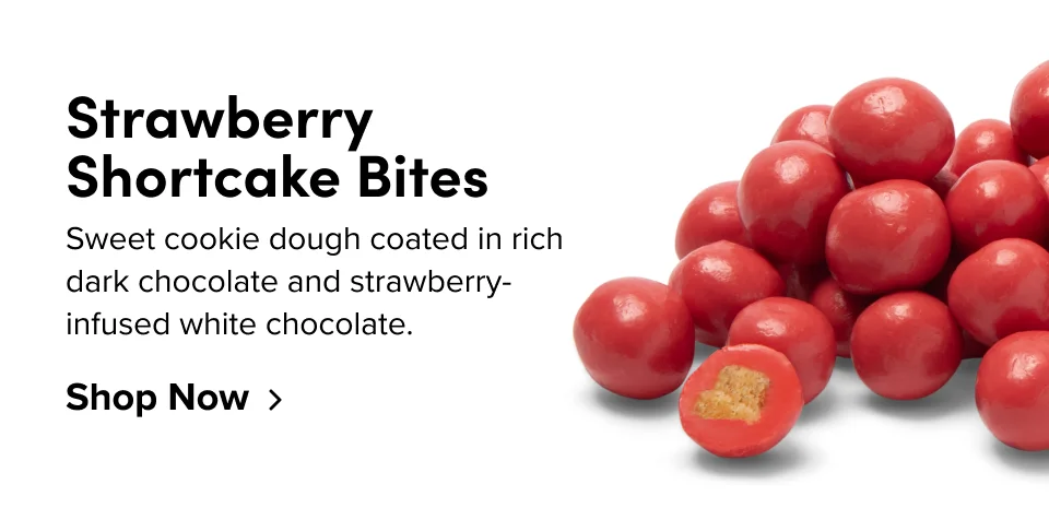 Strawberry Shortcake Bites Sweet cookie dough coated in rich dark chocolate and strawberry-infused white chocolate. Shop Now