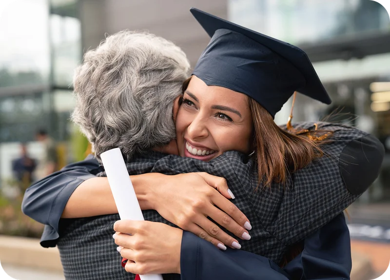 Picture of graduate hugging someone