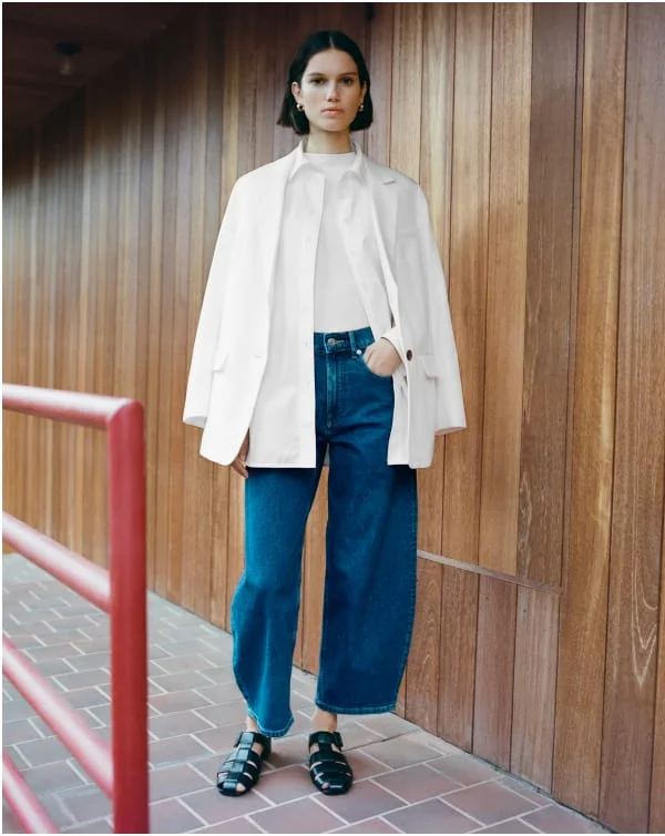 [IMAGE] The TENCEL™ Oversized Blazer, the Supima® Cotton Boyfriend Shirt, the Supima® Micro-Rib Funnel-Neck Tank, the Way-High® Curve Jean, and the Leather Fisherman Sandal