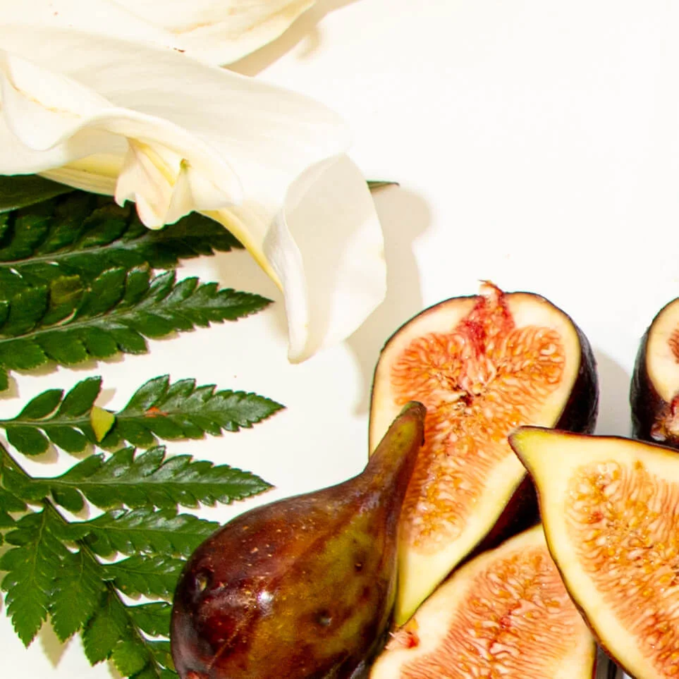 An array of figs, greens and florals