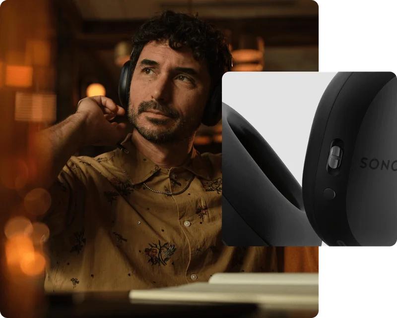 Sonos Ace black young man holding headphones