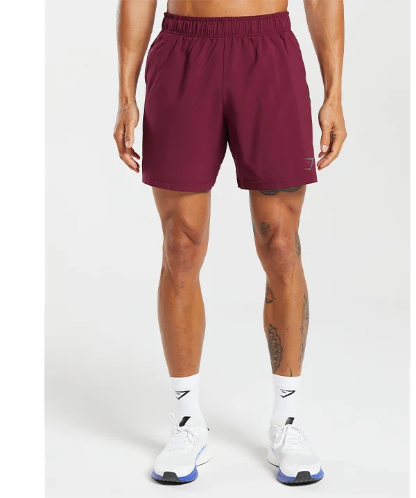 Featuring the Arrival 7'' Shorts in plum pink.