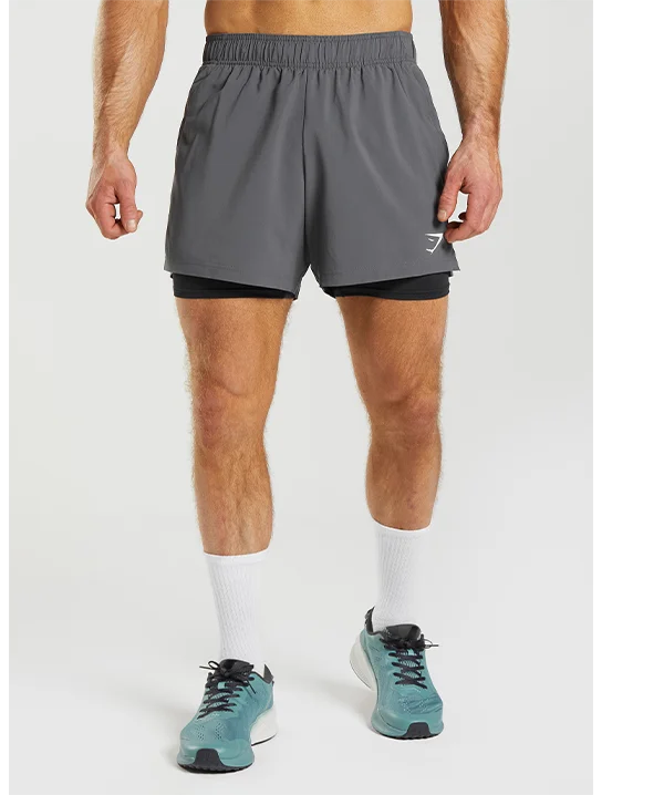 Featuring the Sports 5'' 2 in 1 Shorts in black/silhouette grey.