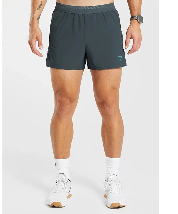 Featuring the Apex Run 4'' Shorts in darkest teal.
