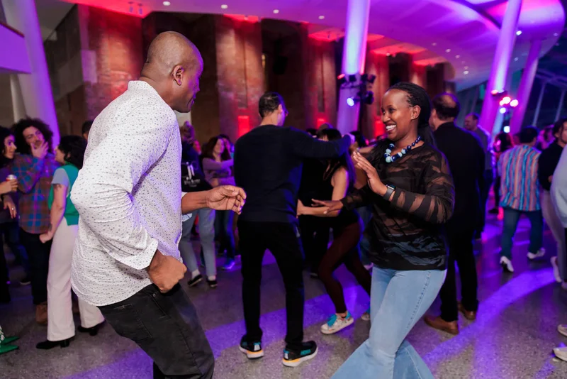 Two people salsa dancing