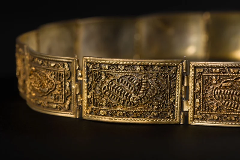Detail of a golden belt