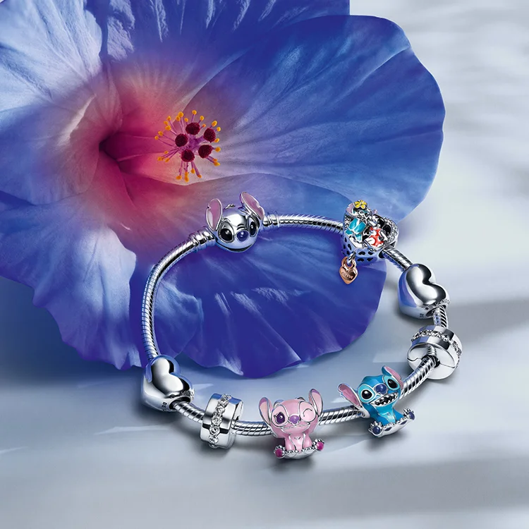 Model wears Disney's Stitch jewelry by Disney x Pandora