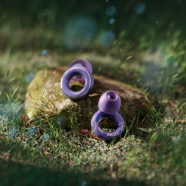 A pair of our new Loop x Tomorrowland Experience 2 earplugs in Purple.