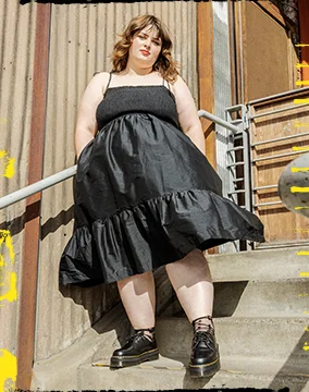 Person wearing dress and Docs