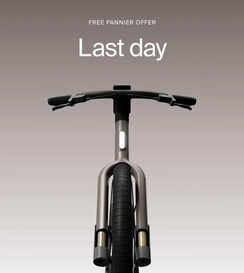 A graphic. Black Friday Cowboy promotion with a rendered e-bike offering €1000 off. Available on top-spec models.