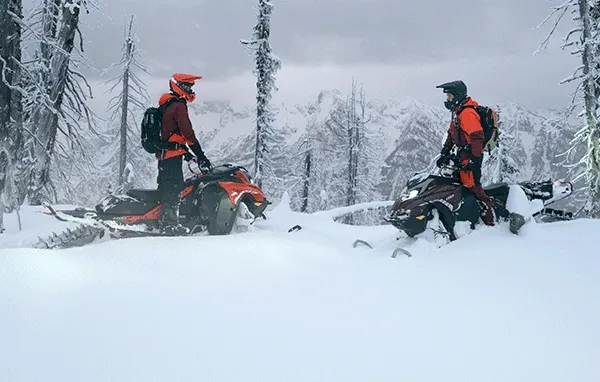 Slideshow of snowmobile riders in action