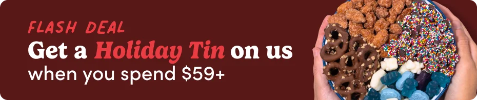 Free Holiday gift tin when you spend $59+ while supplies last
