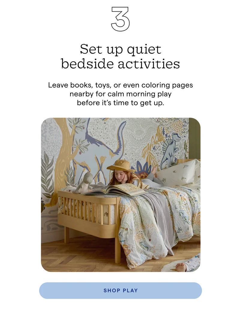an image of a crib with a white blanket on top of it
