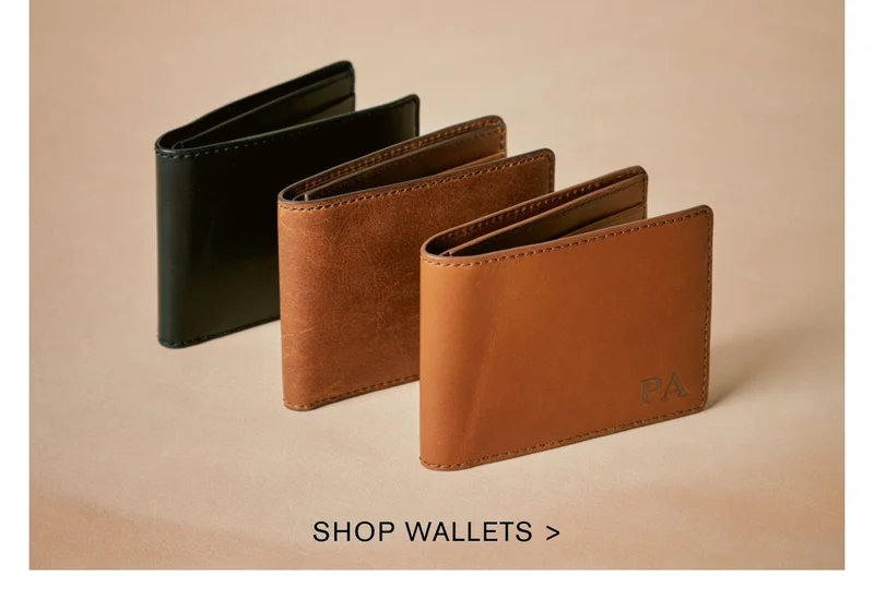 SHOP WALLETS >