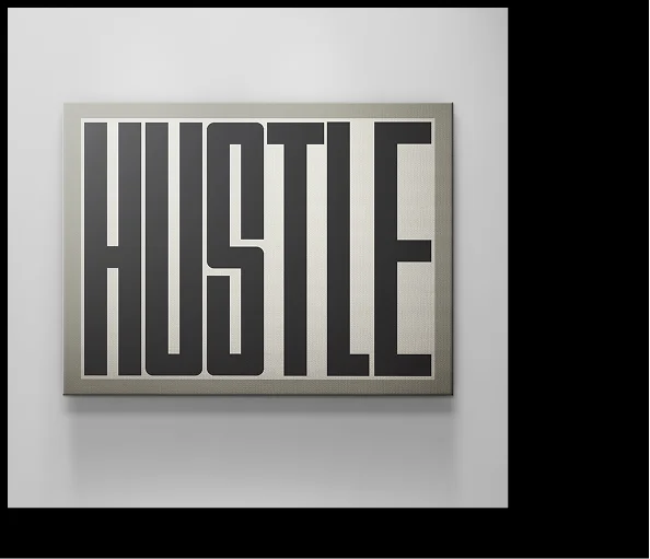 Minimalist framed canvas featuring the word “HUSTLE” in bold, narrow black letters on a beige background, shown against a light grey wall. Minimalist framed canvas featuring the word “HUSTLE” in bold, narrow black letters on a beige background, shown against a light grey wall.
