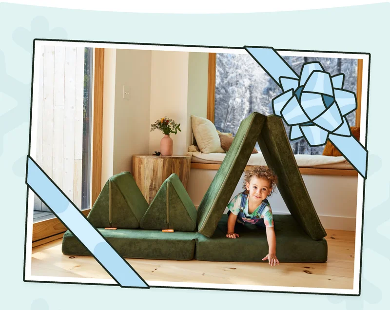 A child plays in a fort made from their Willow Nugget