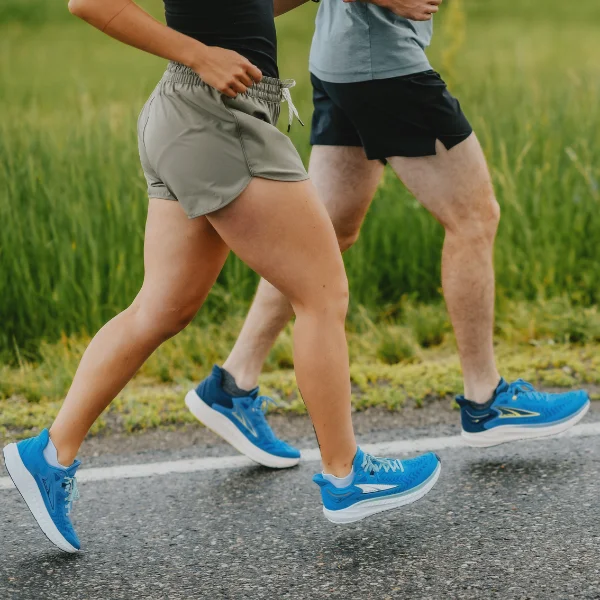 Runners wearing ASICS Gel-Nimbus 26