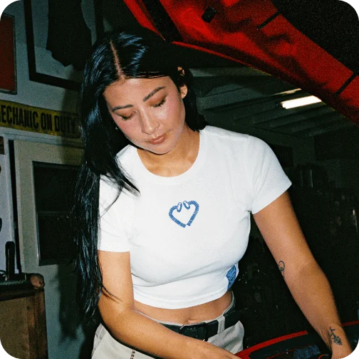 A woman wearing a Ford x Sydney Sweeney T-shirt