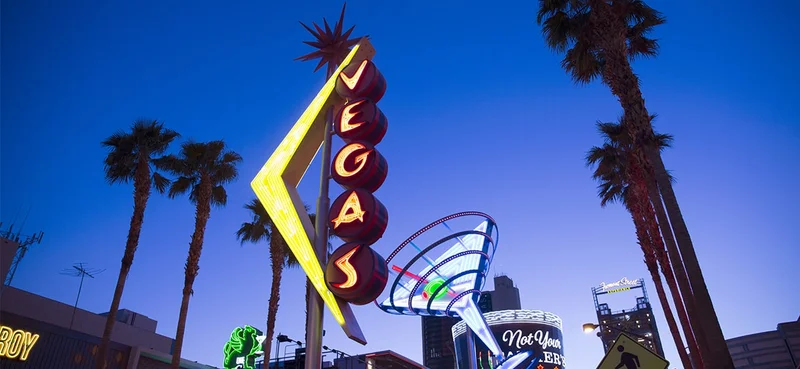 Old retro style neon signs promoting Fremont street gambling.
