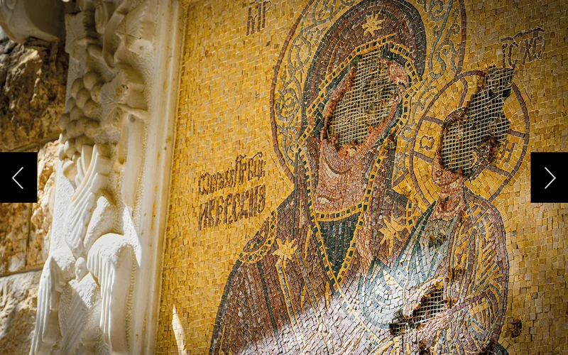 A defaced mosaic of the Virgin Mary outside a Greek Orthodox convent in Maaloula.