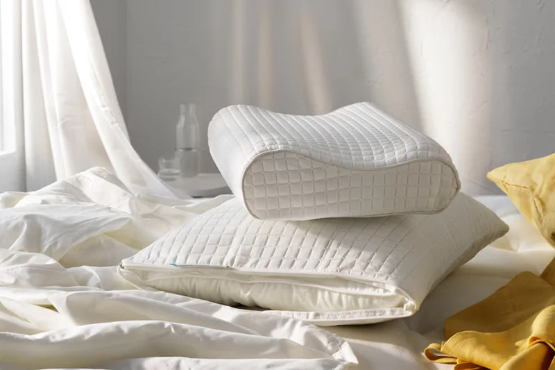 Pillows and comforters on bed