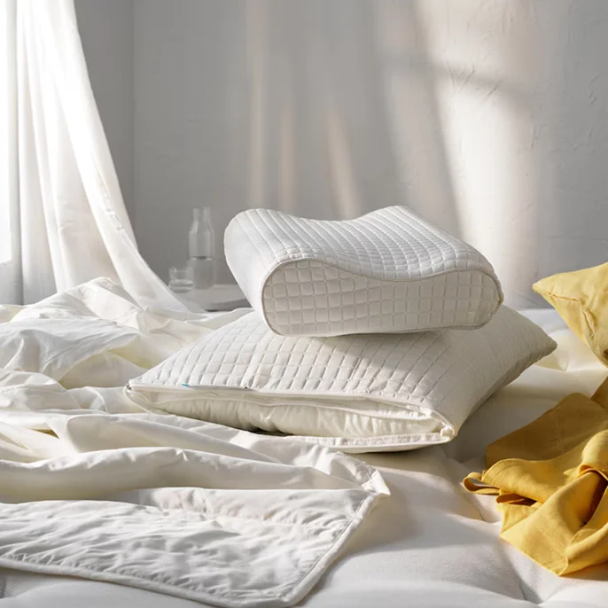 Pillows and comforters on bed