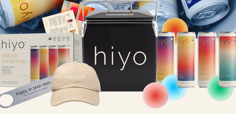(image of hiyo 12-pack variety pack, stainless steel can opener, never wasted dad hat, cooler, cans of hiyo, and coasters).
