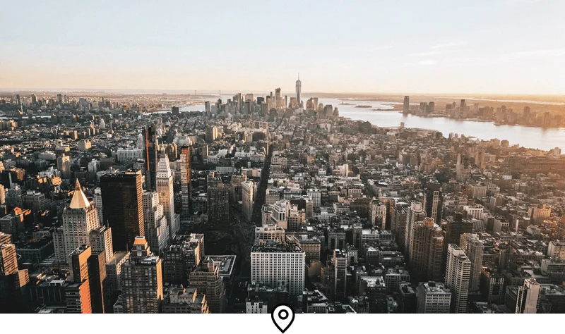 Image Description: A view of New York City’s vast cityscape from the Empire State Building’s 86th floor