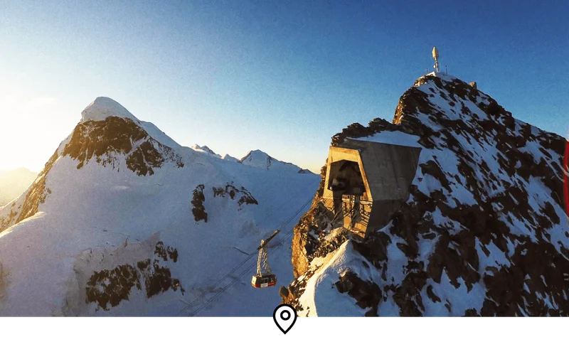 Image Description: A cable car ascending to Matterhorn Glacier Paradise, Europe’s highest cable car station