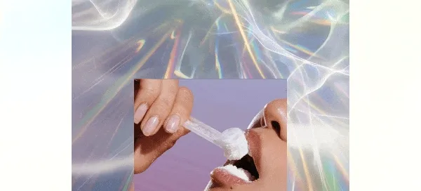 Close-up animation of a person pouring white powder from a scoop into their mouth against a soft, iridescent background.