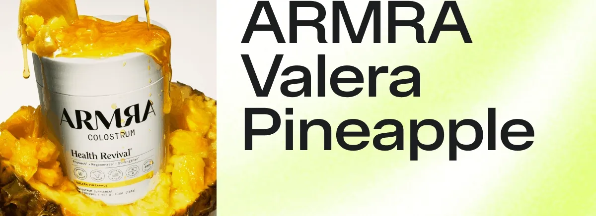 Animated ARMRA Colostrum container surrounded by dripping pineapple and juice.