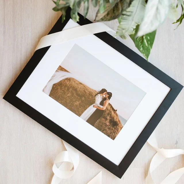 Framed print of couple.