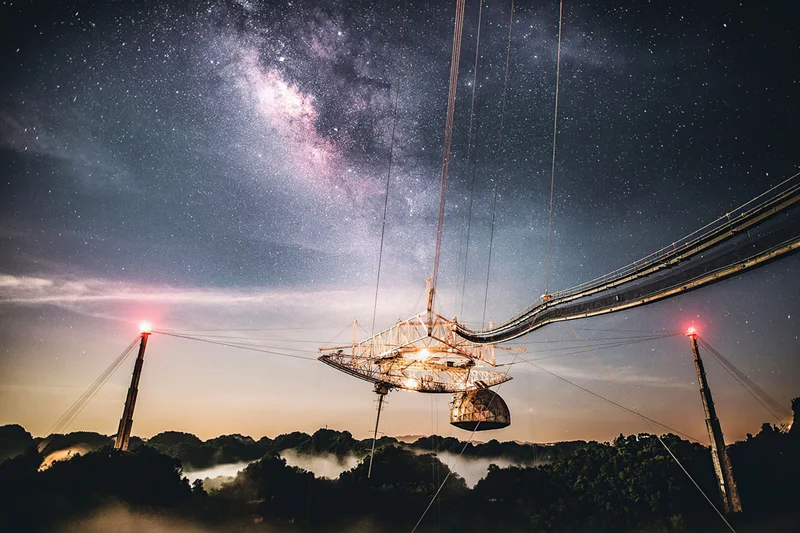 The Arecibo Observatory in Puerto Rico was home to one of the largest radio telescopes in the world, until its collapse in 2020. The observatory detected naturally occurring signals from deep space and transmitted humanity's first message to life beyond Earth.
