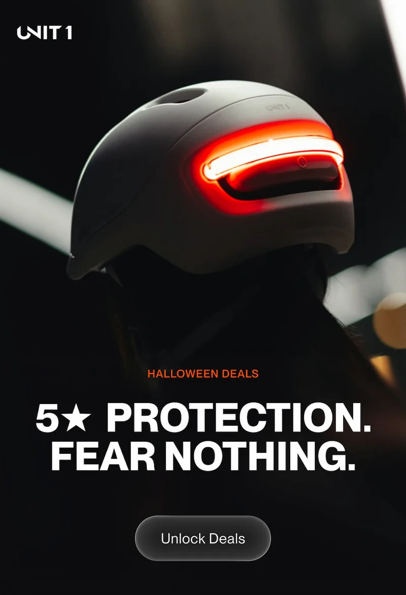 UNIT 1 Smart Helmet glowing red light at night with text: 5-Star Protection. Fear Nothing.