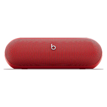 Beats Pill speaker in Statement Red floating against a light gray background