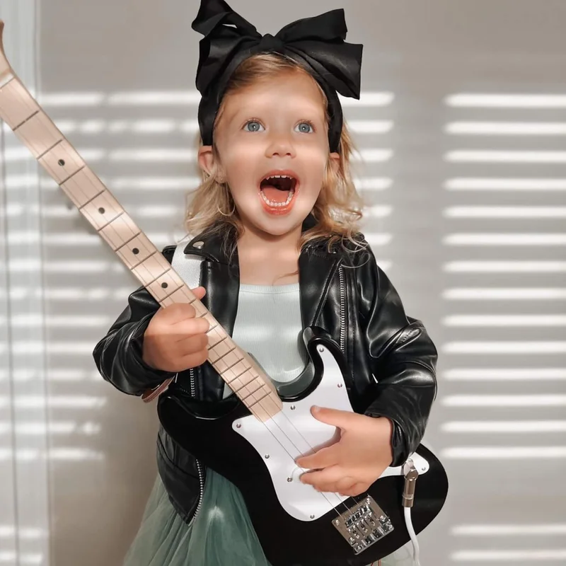 Kid playing guitar