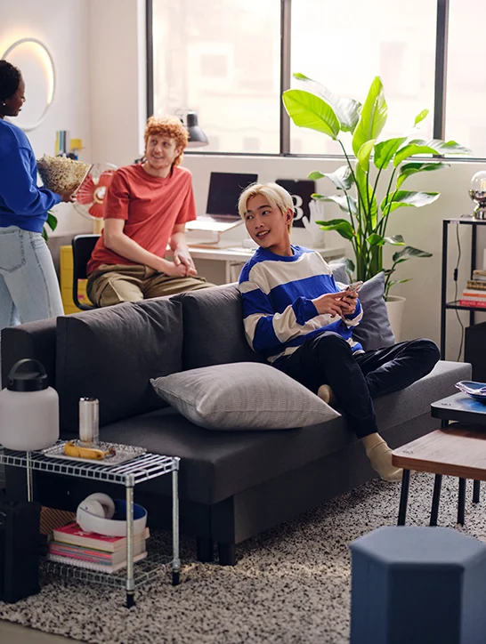 Students sitting in a dorm room